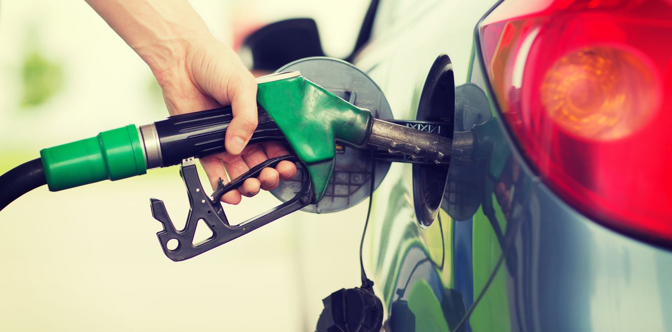 Filling up a car with fuel.